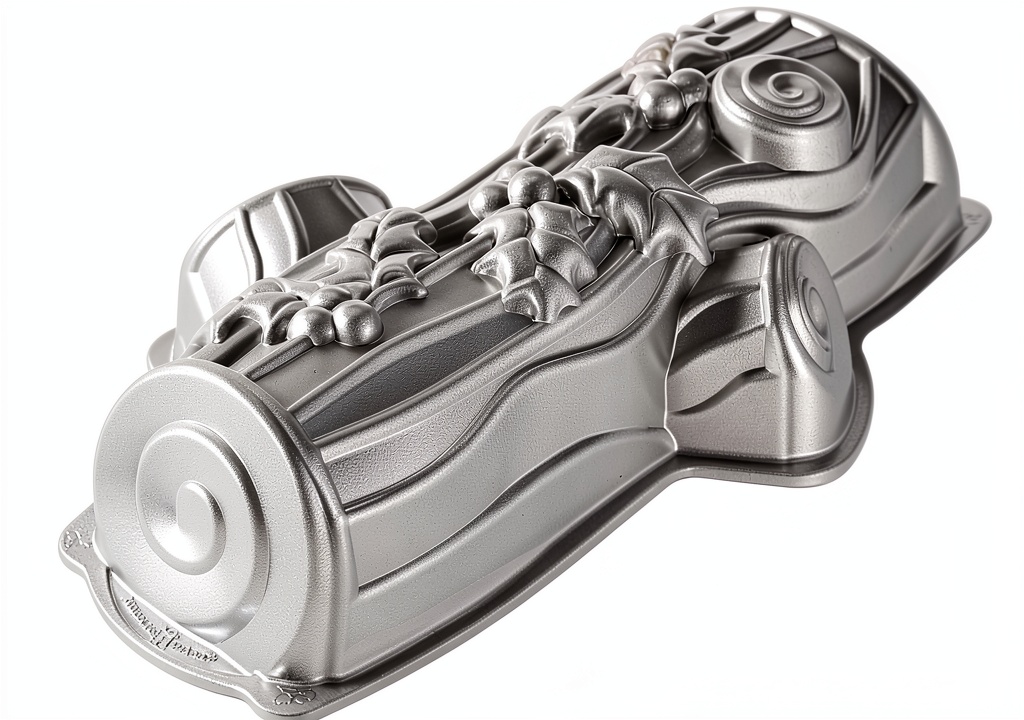 Nordic Ware Yule Log Cake Pan on a kitchen counter with a freshly baked cake